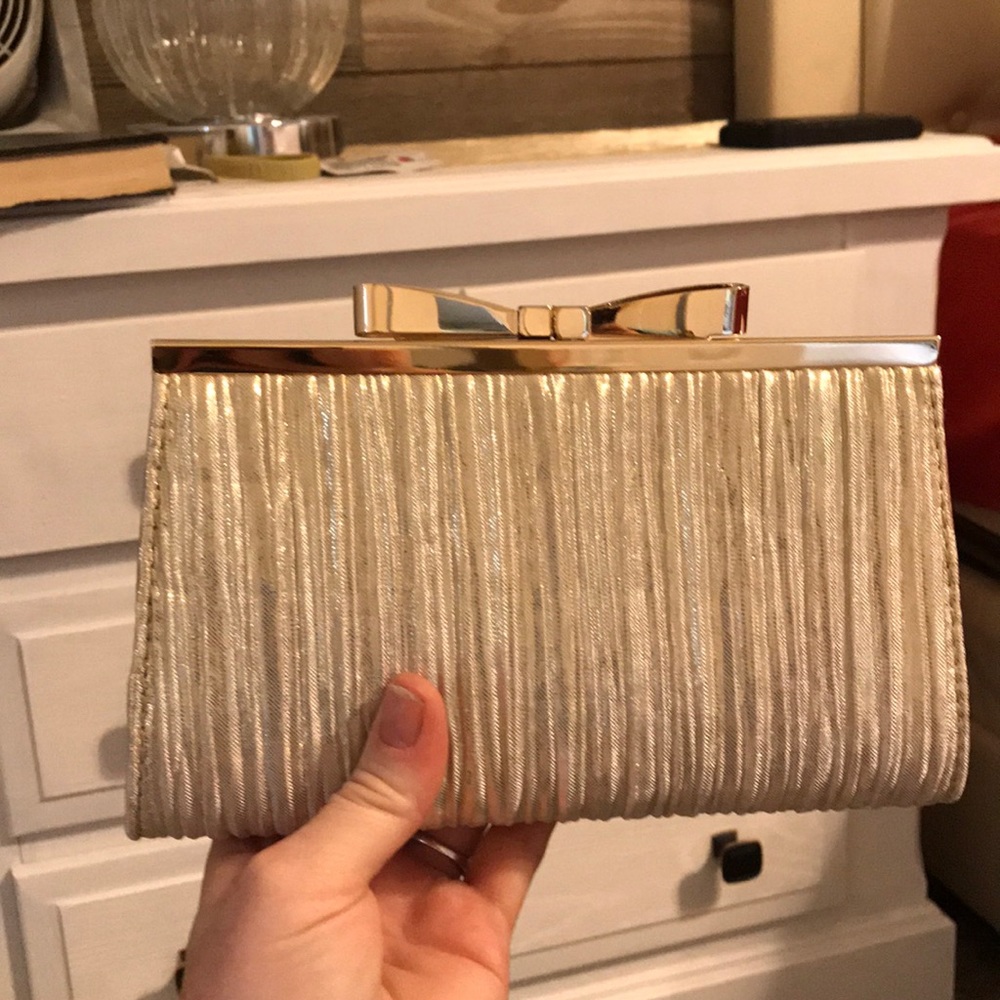Super cute gold clutch BN